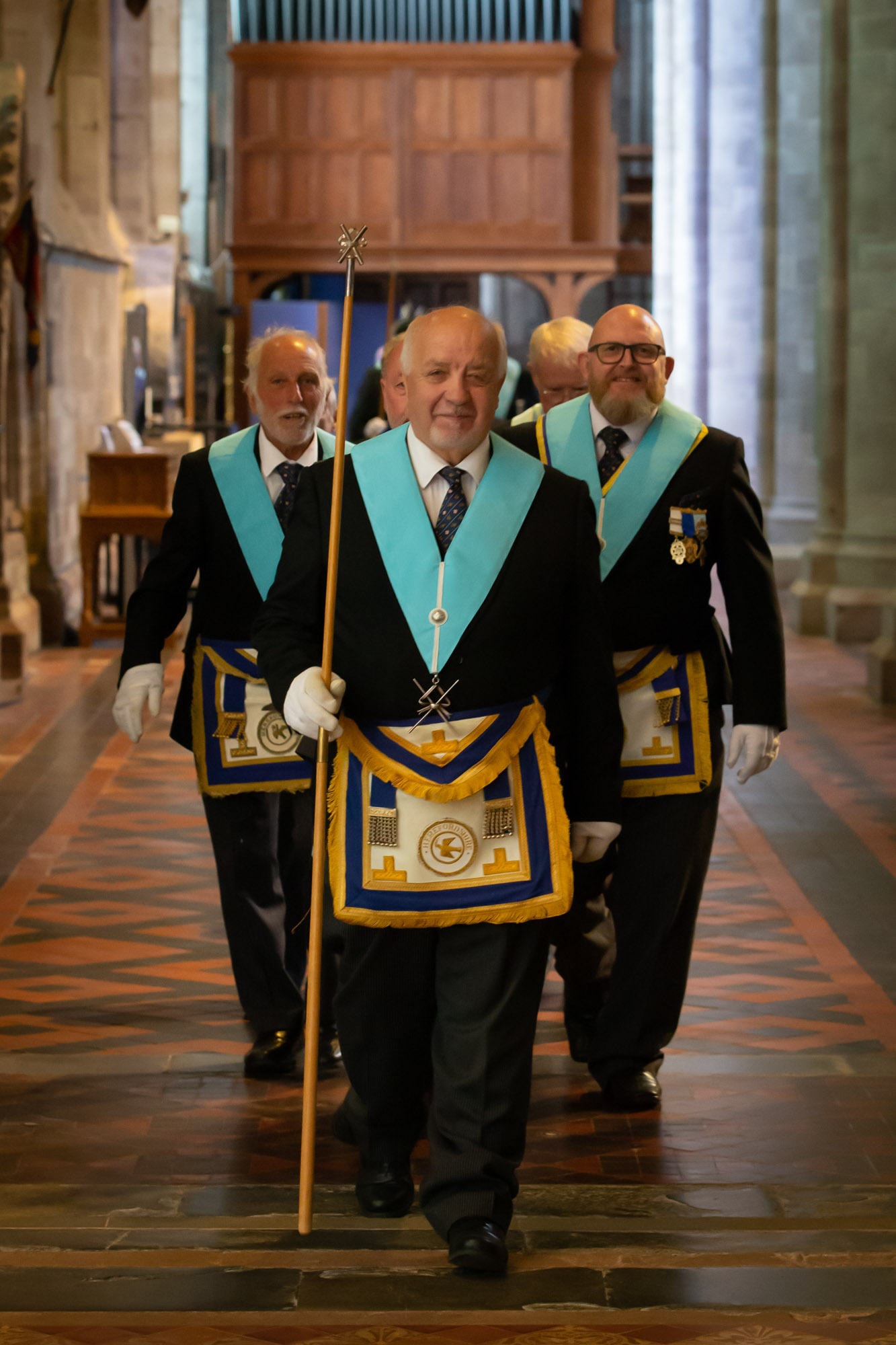 Photo in the Cathedral W Bro John Mayo-Evans leading Vaga Lodge in, flanked by W Bro Gordon Williams and W Bro Pete White.