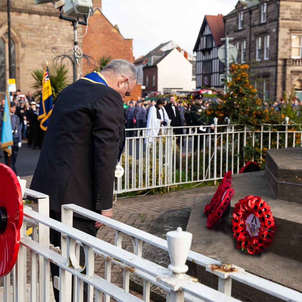 PGM RW Bro Michael Holland laying the wreath at the Remembrance day parade in St Peter's Square Hereford